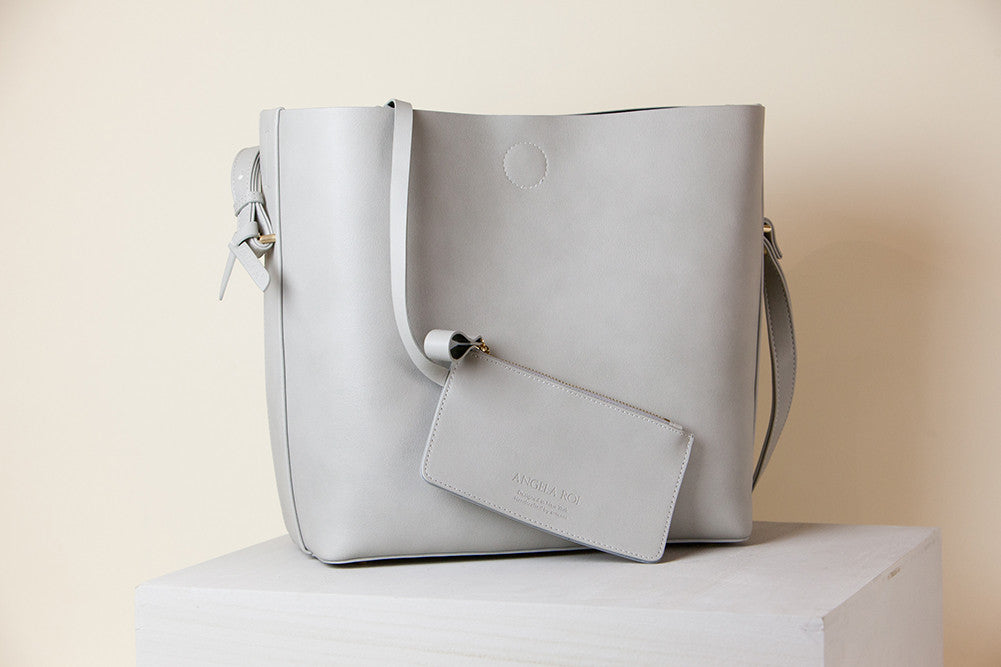 large grey oilskin bucket bag